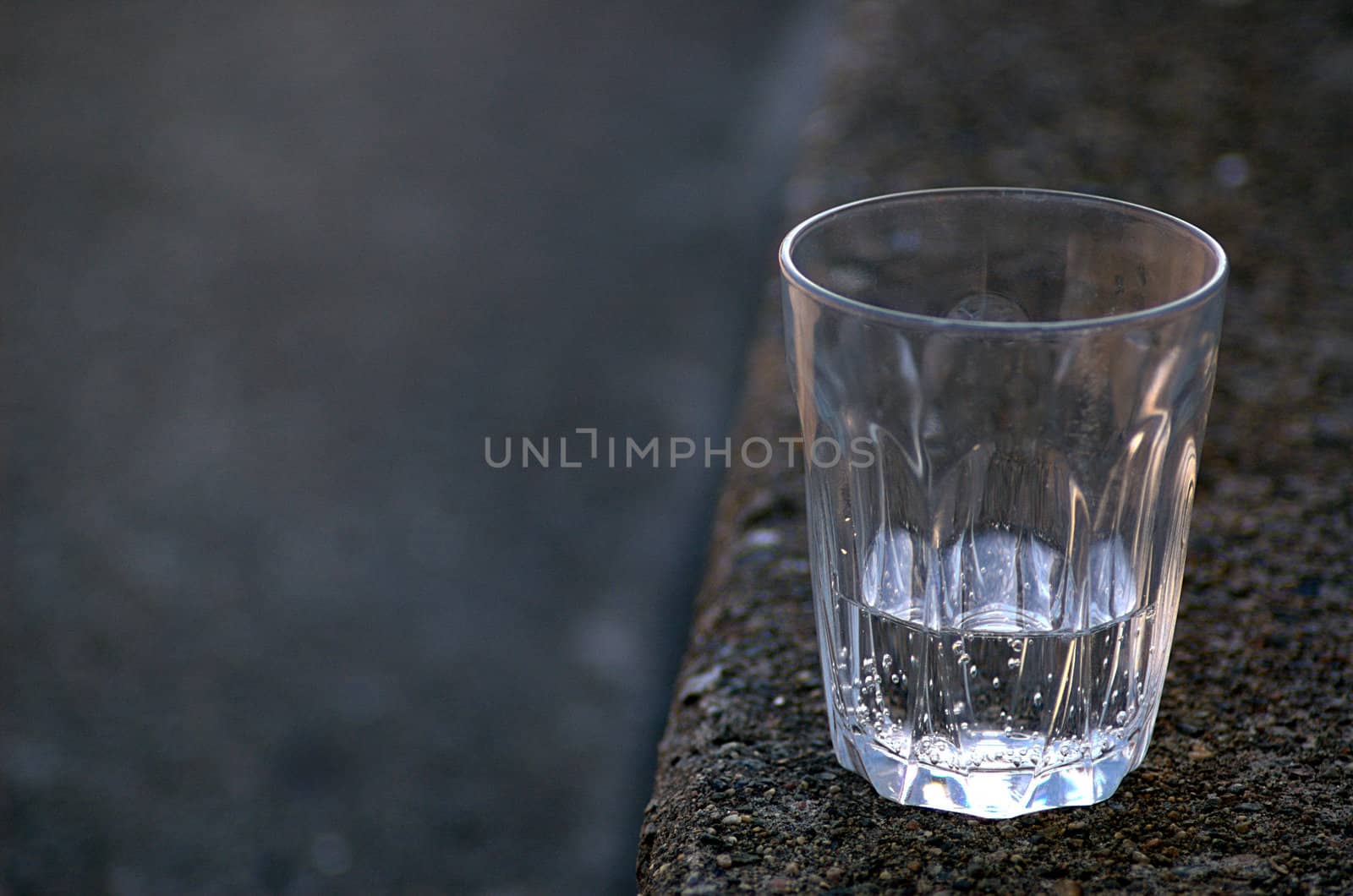 Glass of water by sundaune