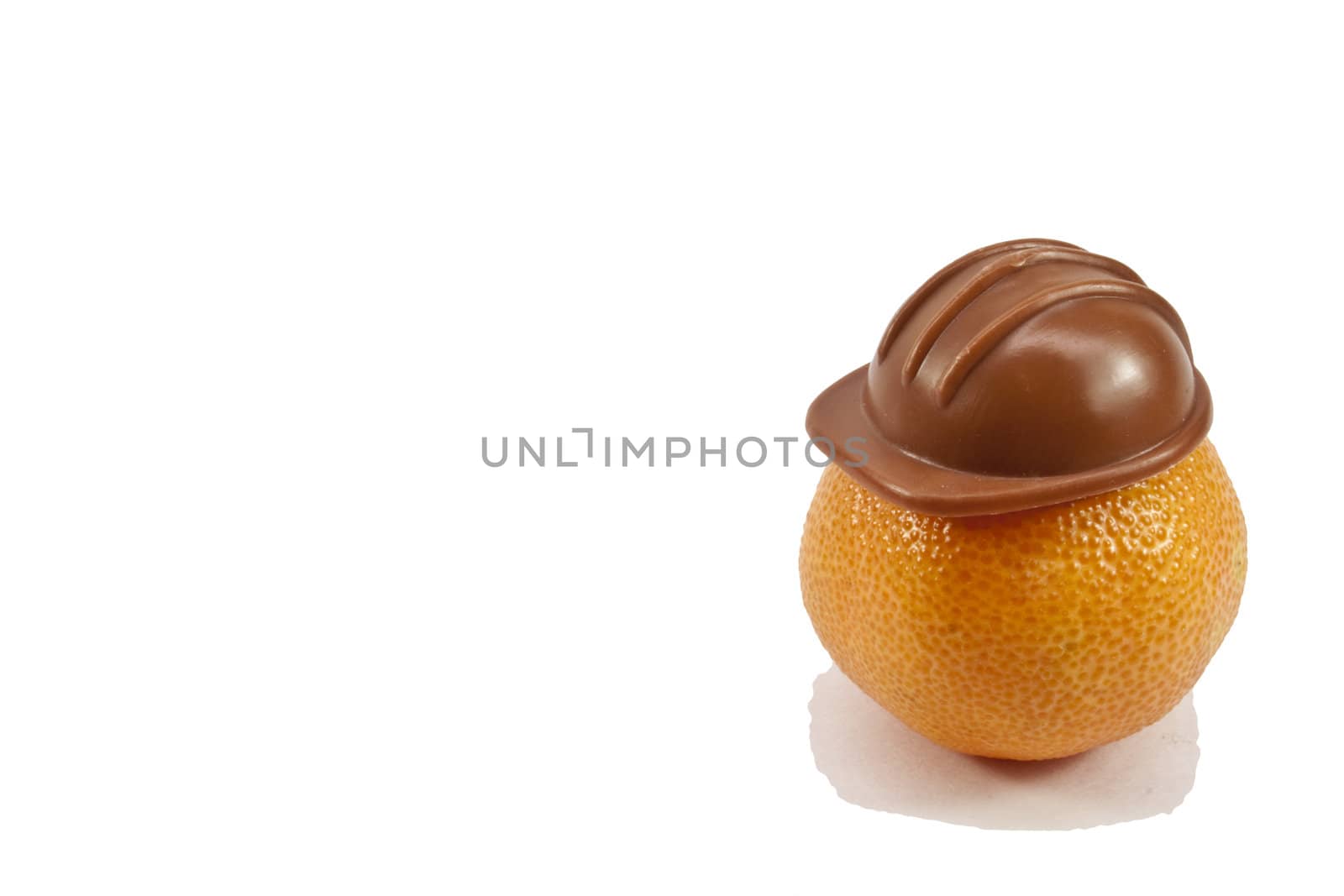 fresh tangerines in the headgear on a light background