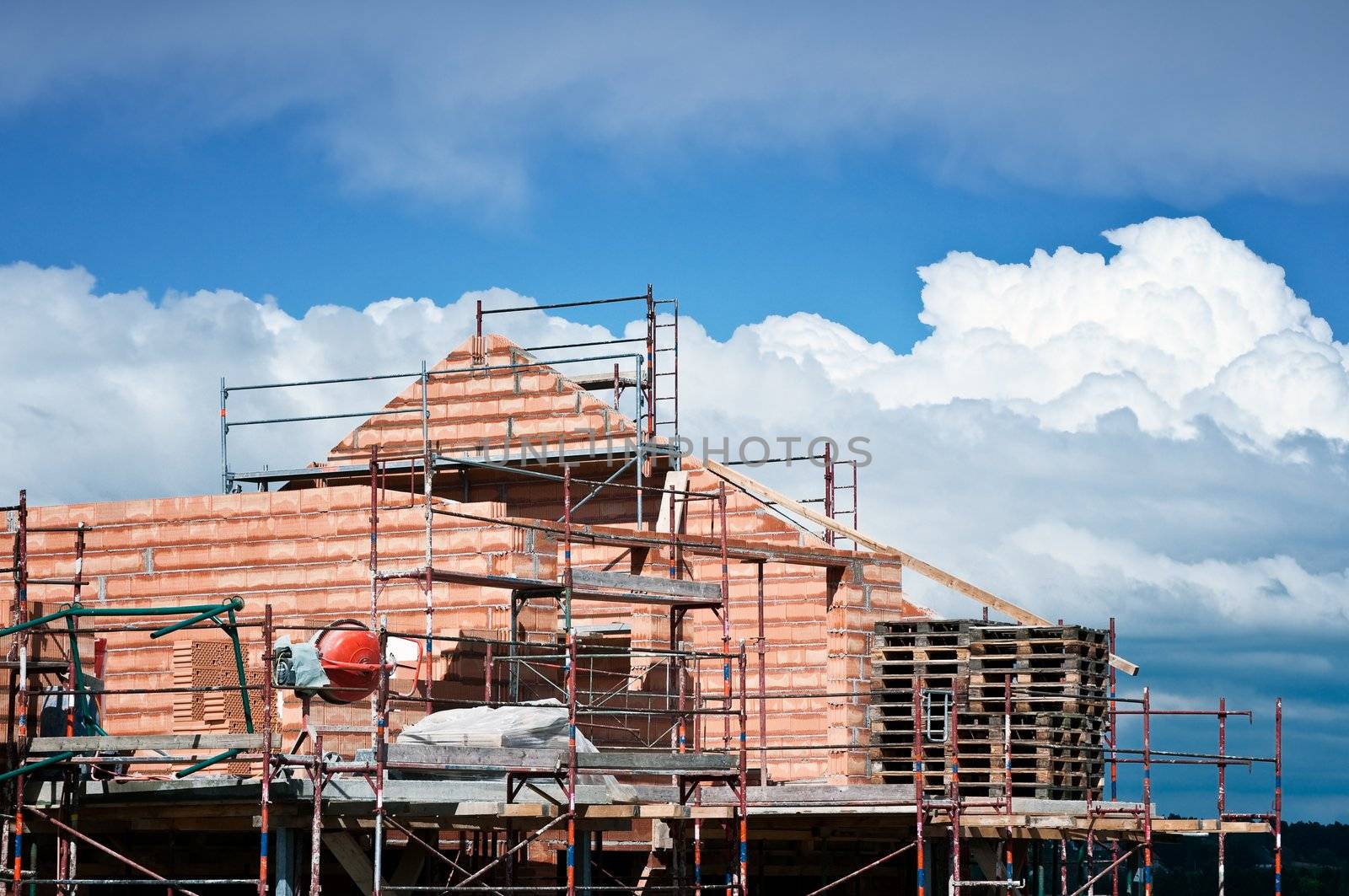 New house under construction with a Cloudscape