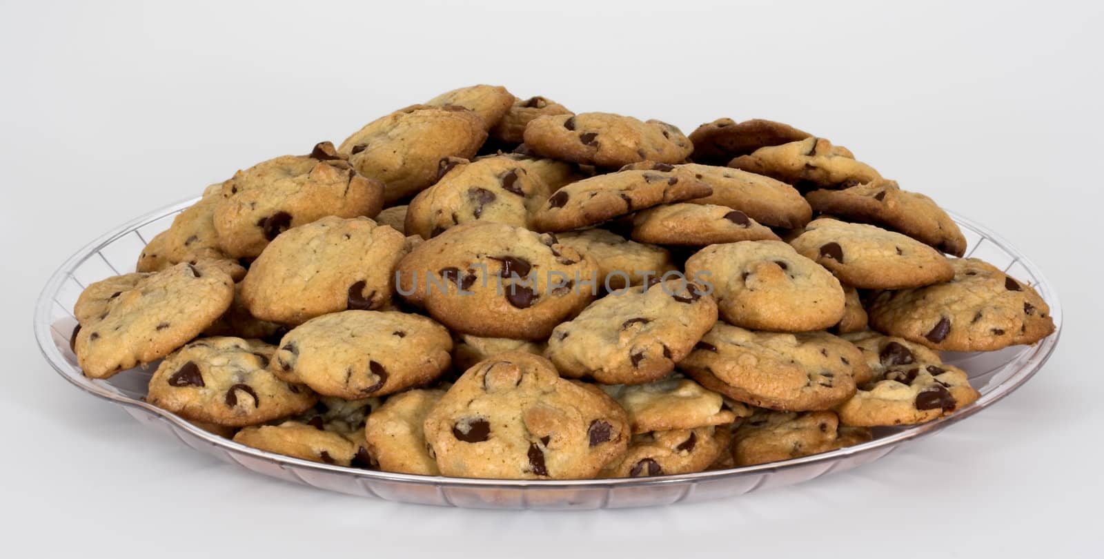 An isolated tray of chocolate chip cookies on a white background