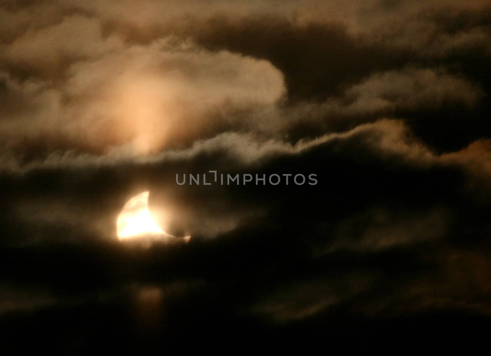 Partial solar eclipse visible in the sky above Brno, 4 January 2010 in Brno, Czech Republic