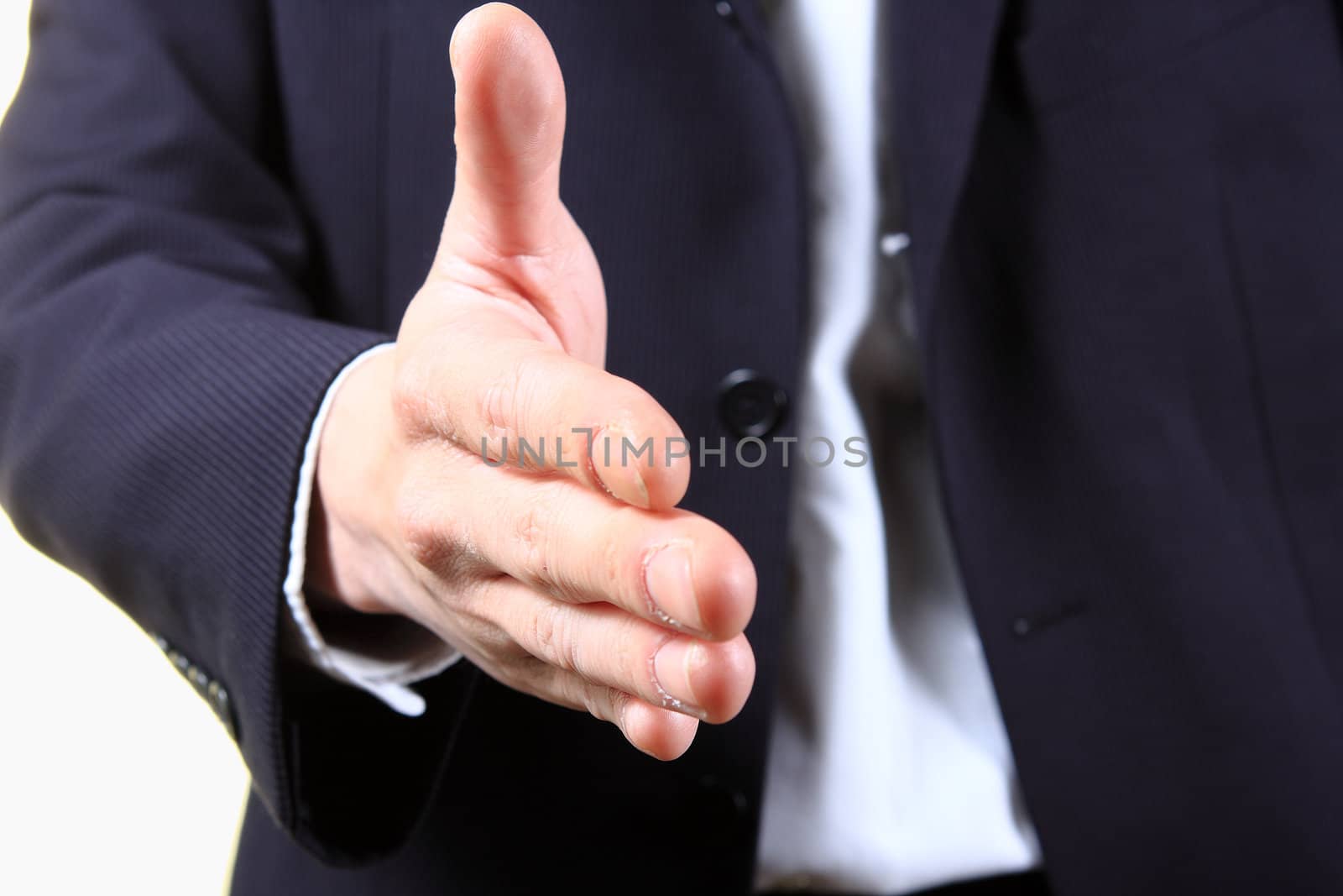 business man with an open hand ready to seal a deal 