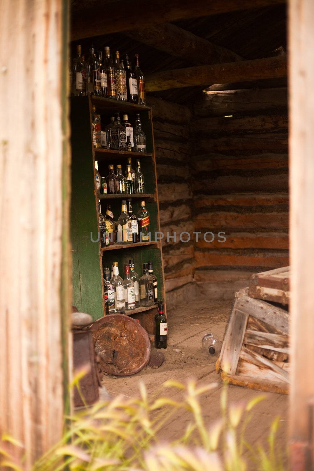 Collection of empty liquor bottles by PiLens