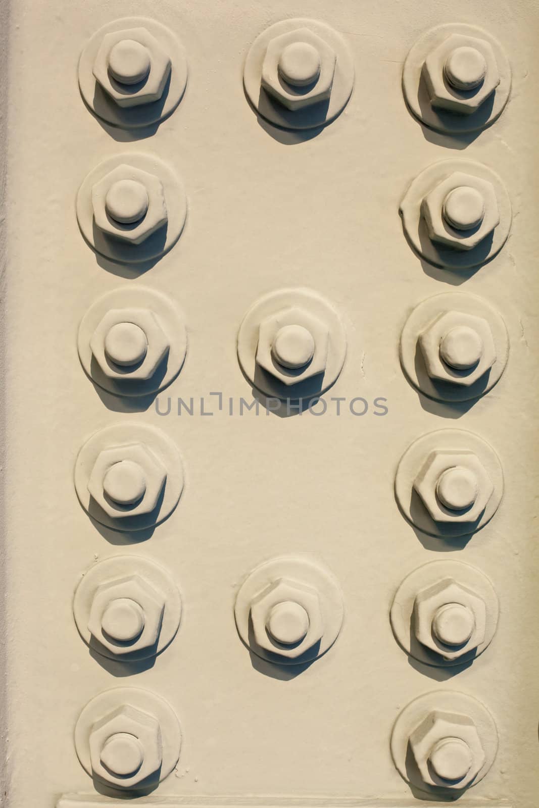 Painted bolts of steel structure (bridge) make abstract background texture