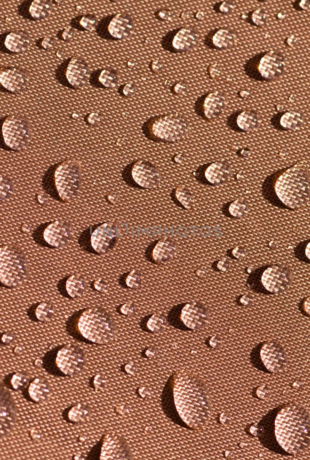 Droplets on brown fabric by PiLens