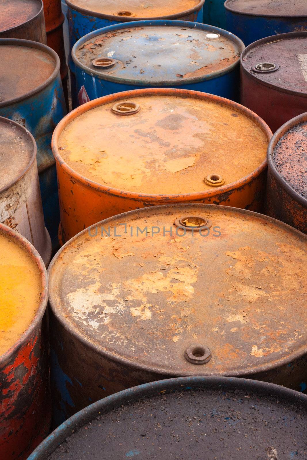 Rows of rusty barrels