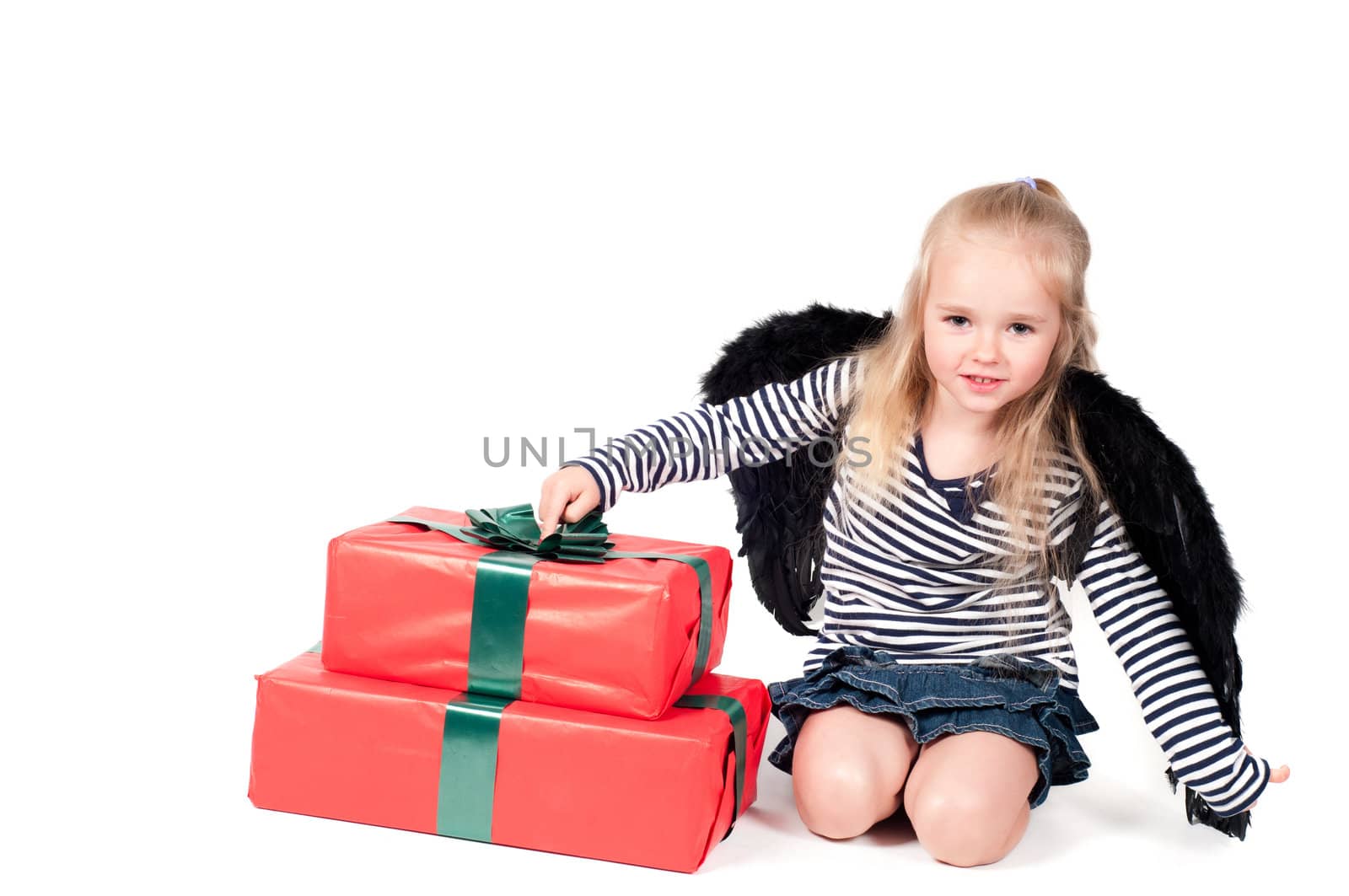 Shot of little cute girl with long hair in studio