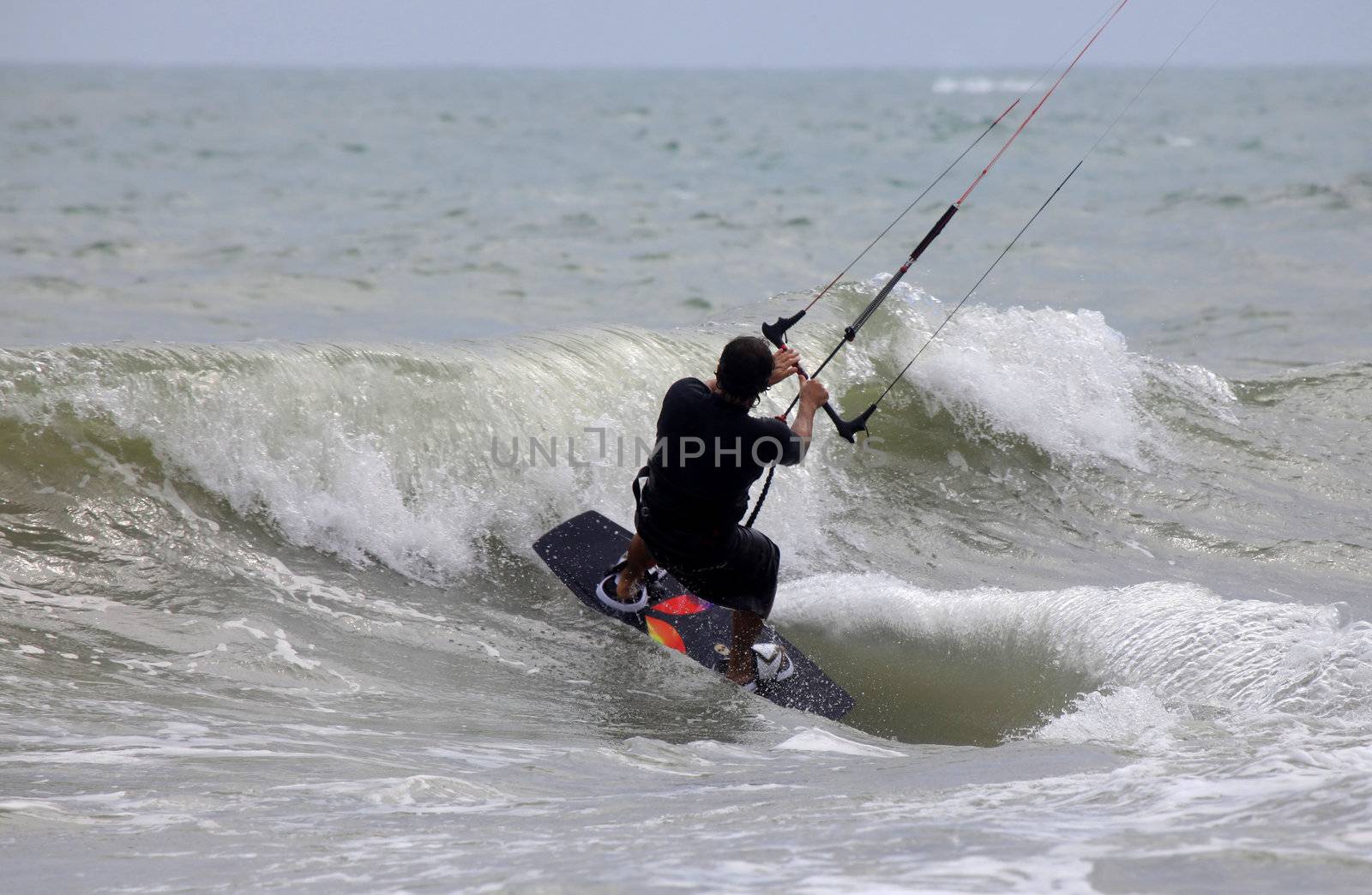 Kitesurfer in action by friday