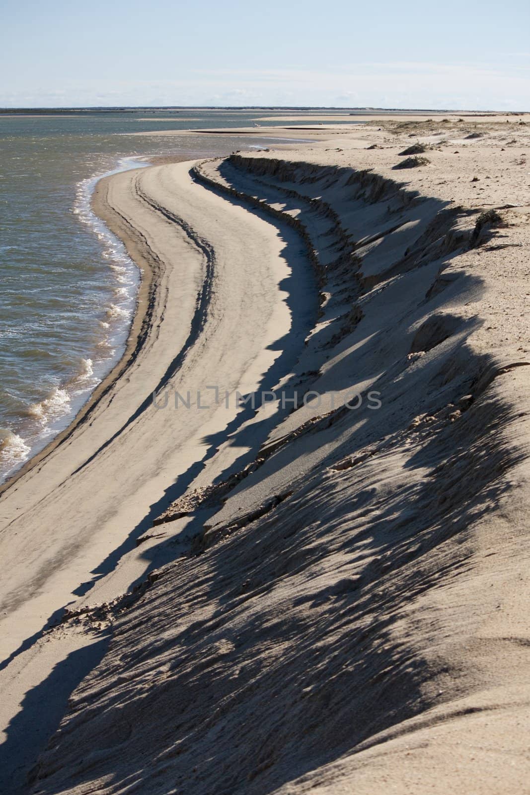 View of the shoreline of a beautiful beach on the Algarve, Portugal.