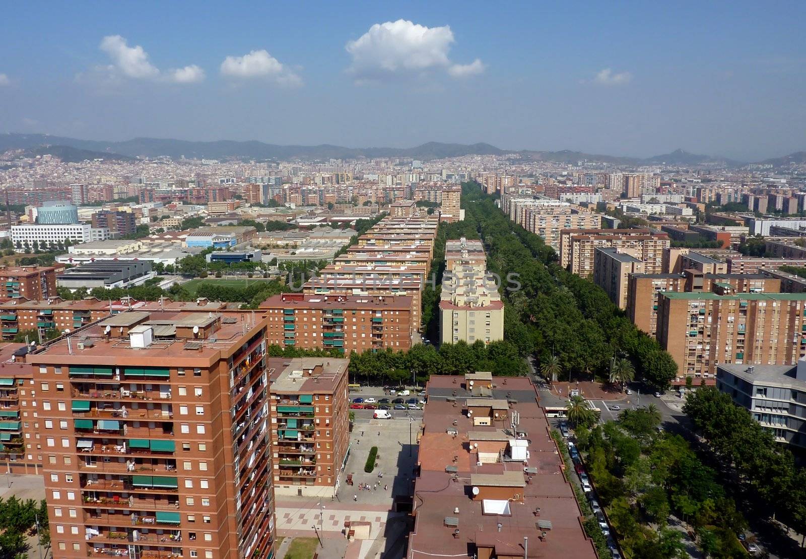 Aerial view of red buildings and streets in Barcelona, Spain