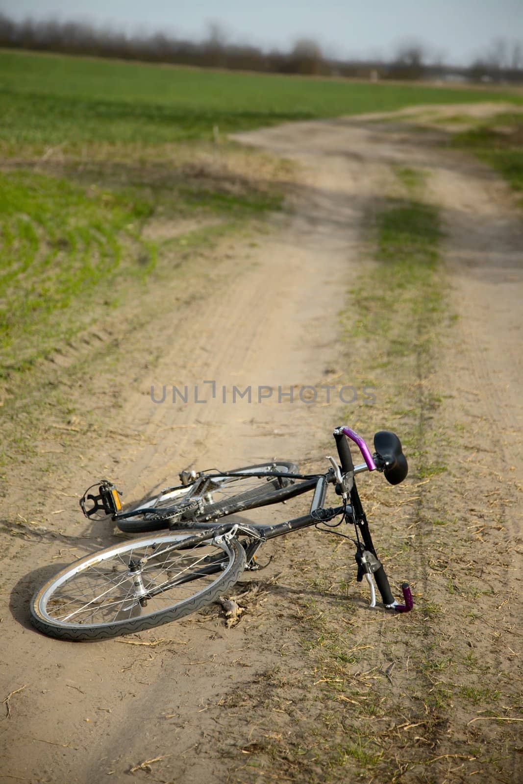 Bicycle left on a dirtroad