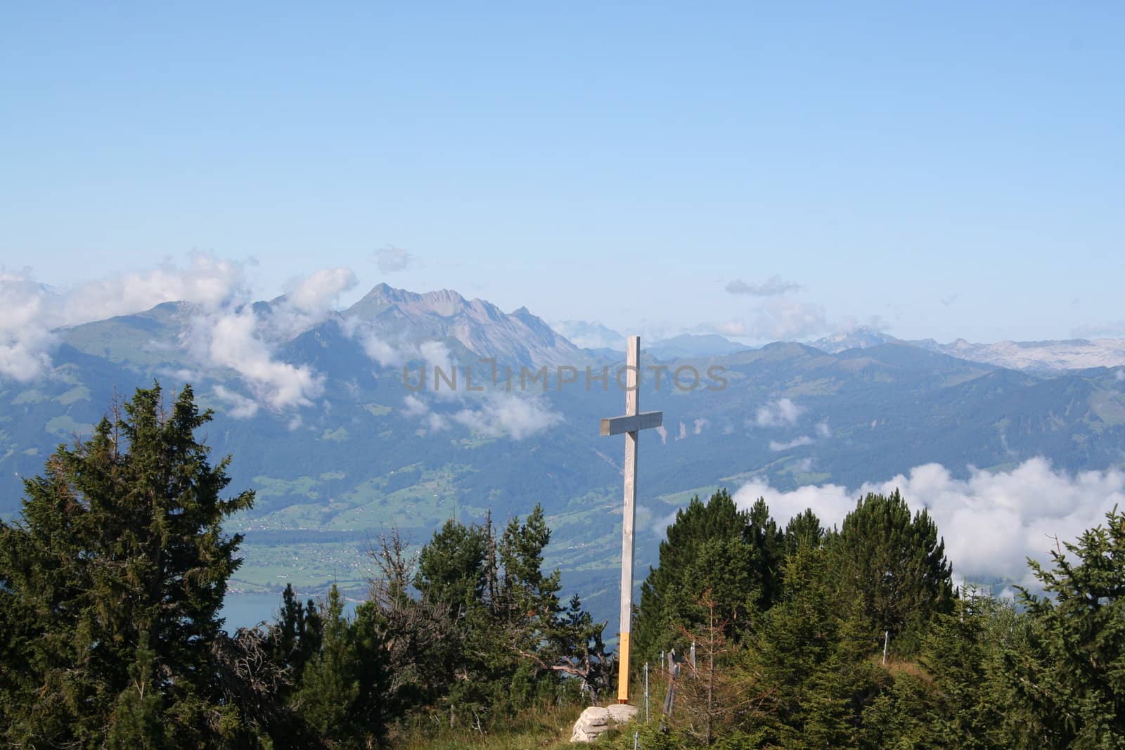Cross in Swiss alps by ronlan