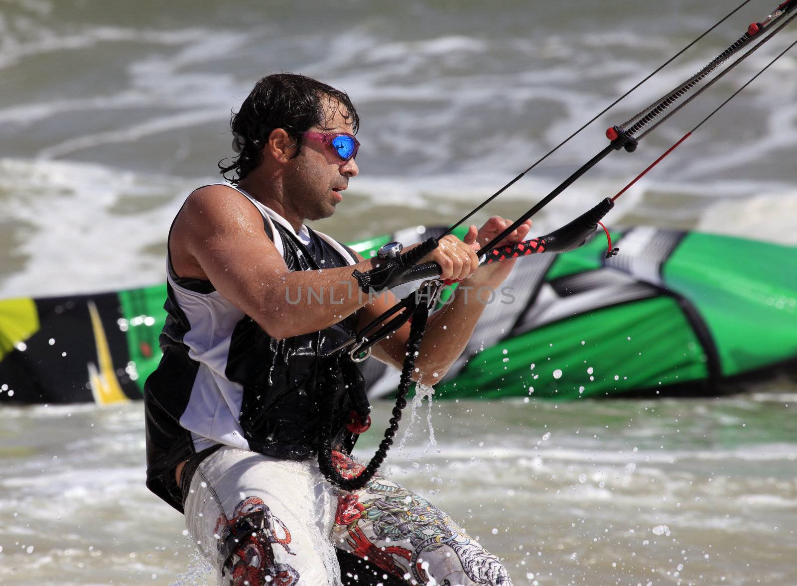 Kiteboarder enjoy surfing in water. Vietnam