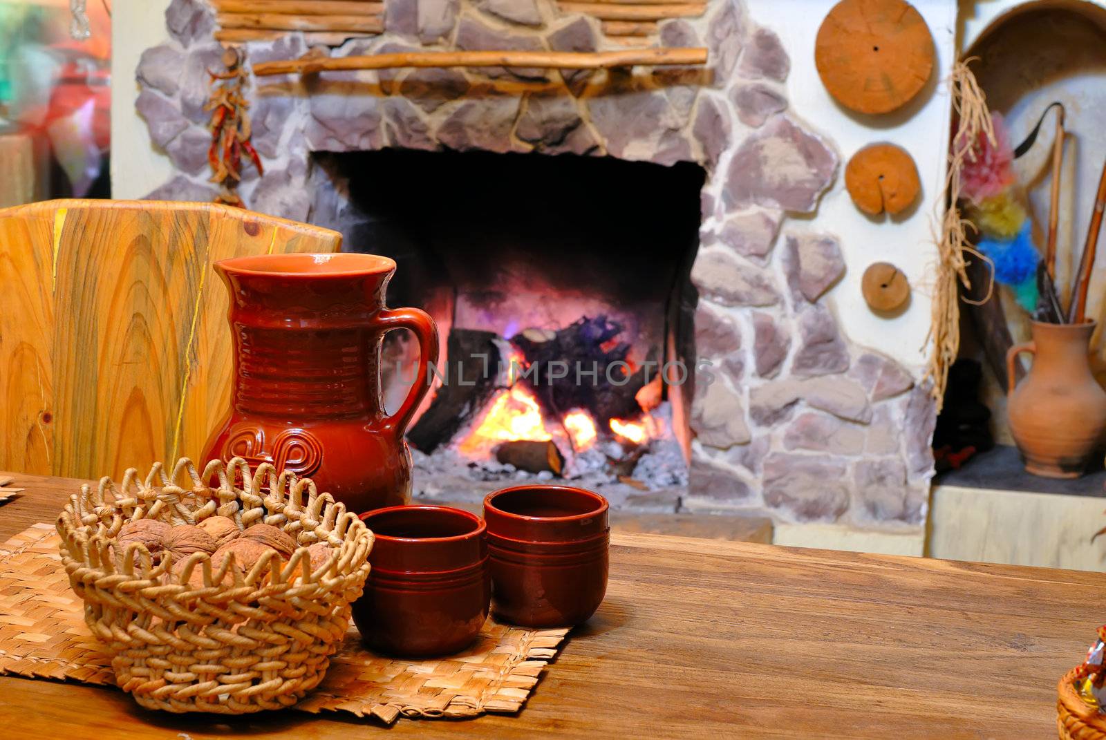 comfort of home hearth with a jug of wine