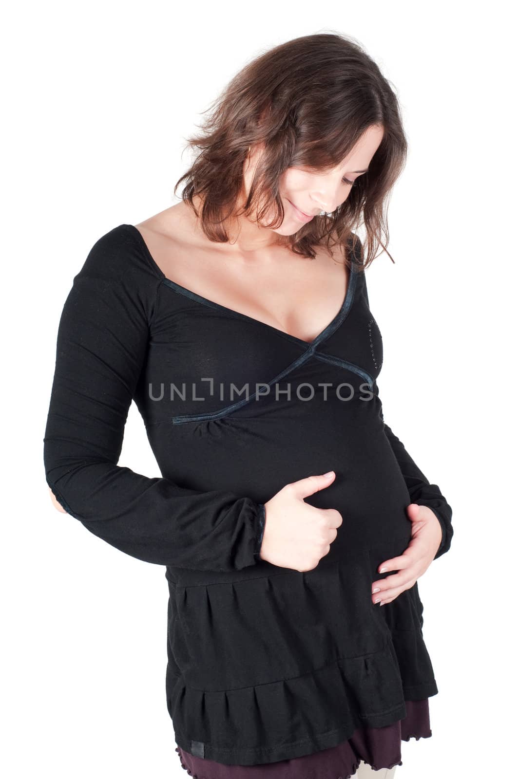 Portrait of pretty pregnant woman in black dress isolated on white