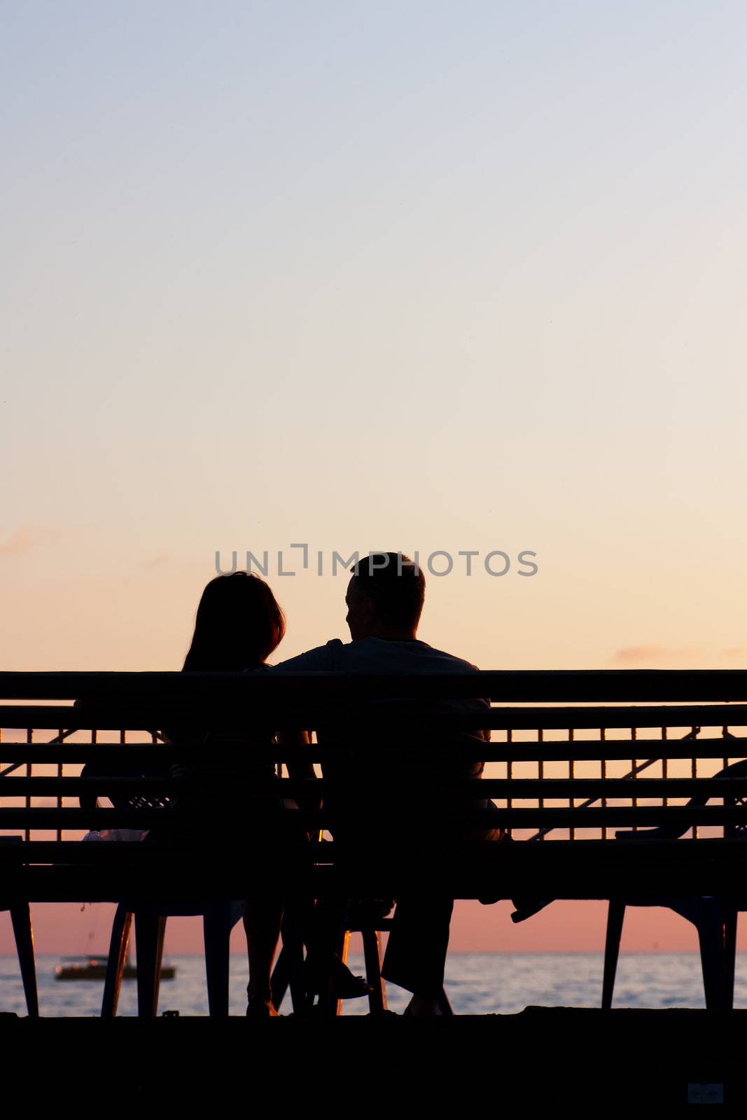 Romantic Couple at Sunset by AGorohov