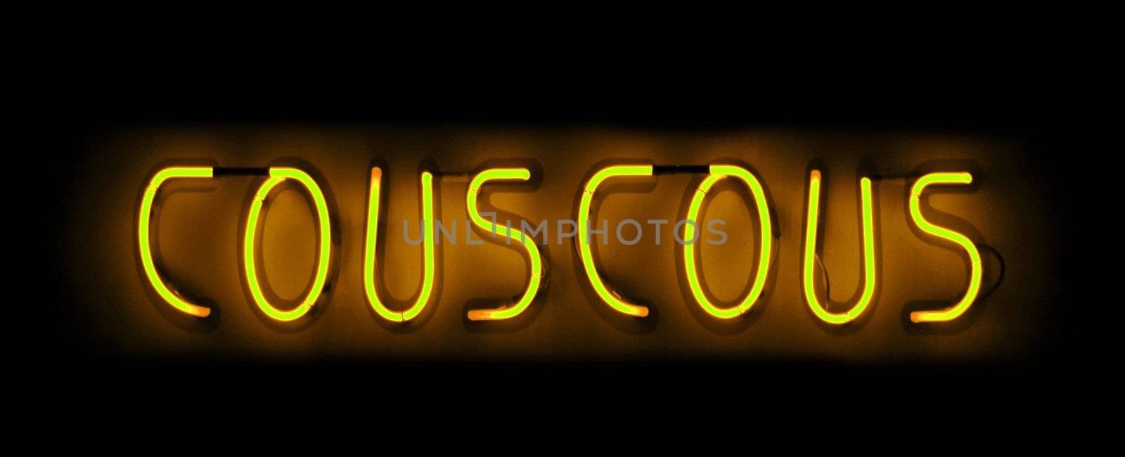 Couscous neon sign in yellow on black background in France