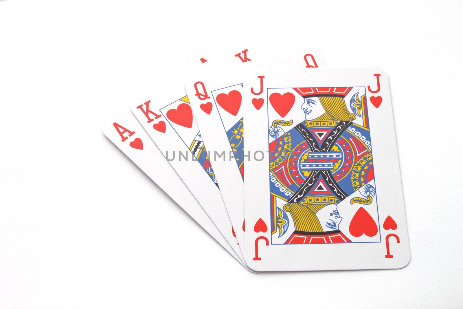 Gambling with playing cards over a white background.