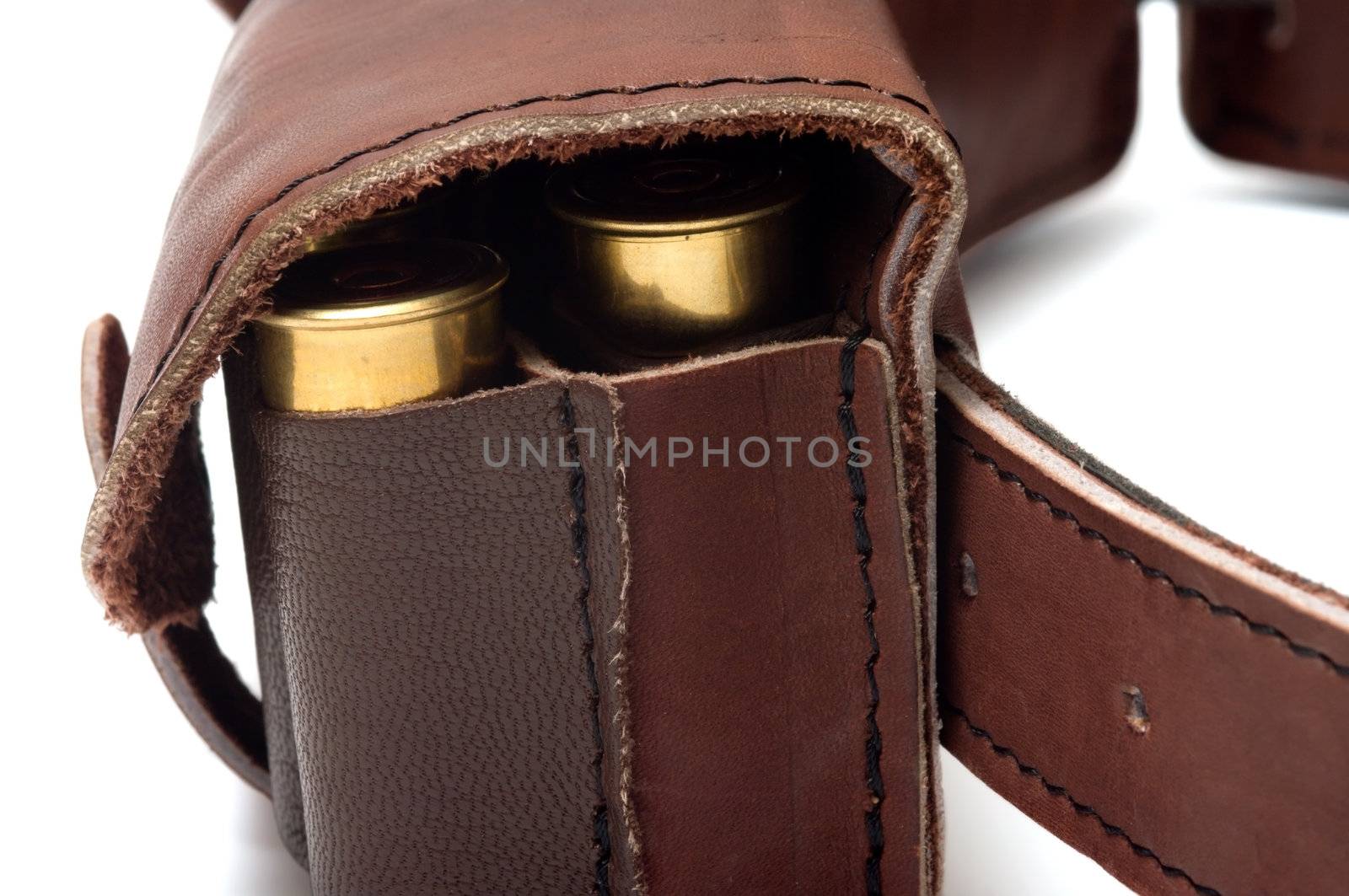 Brown leather bandolier of bullets on a white background.