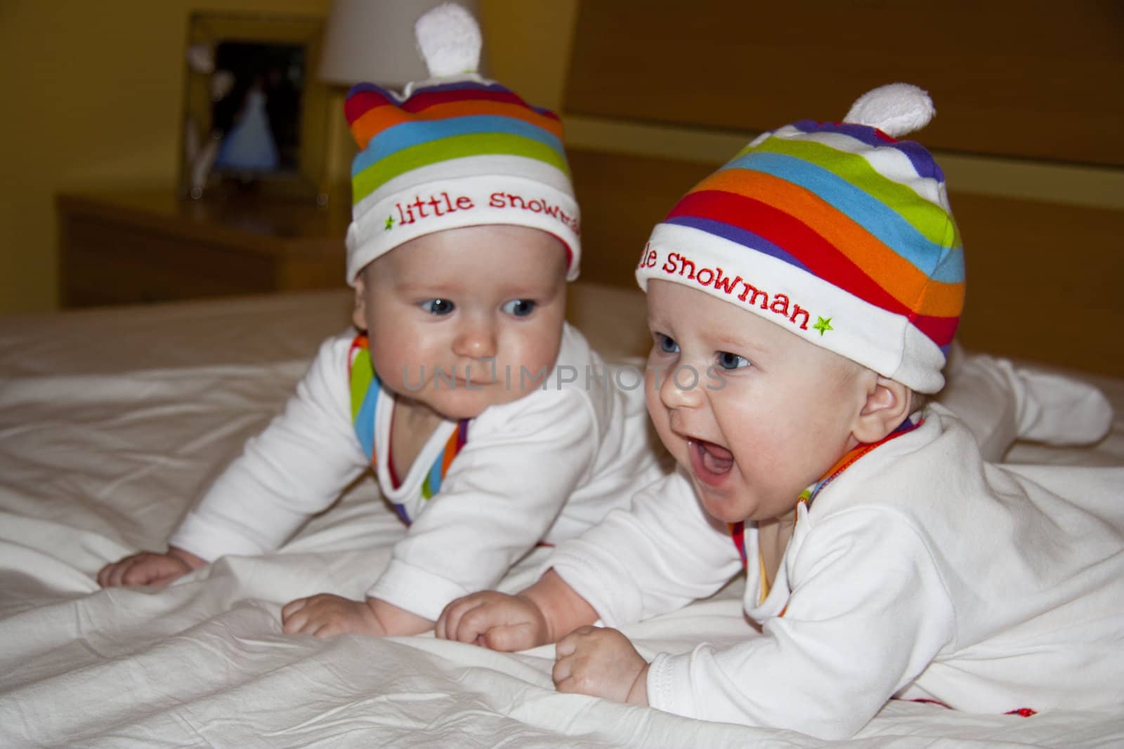 Twins wear white little snowmans body