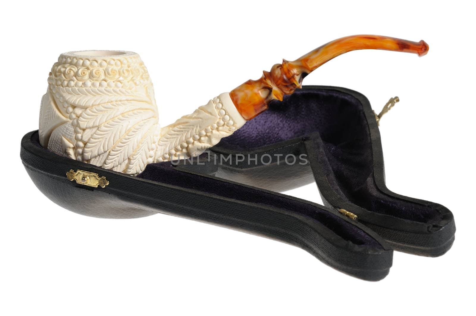 Tobacco pipe from meerschaum on a stand. Isolated on white.