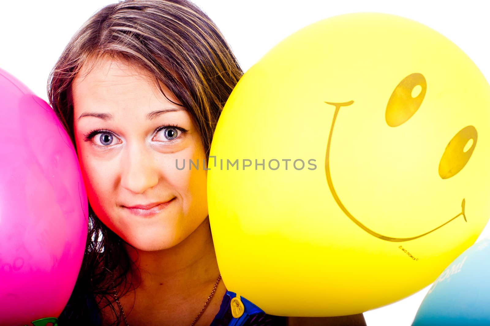 Woman with ballons in studio isolated on white