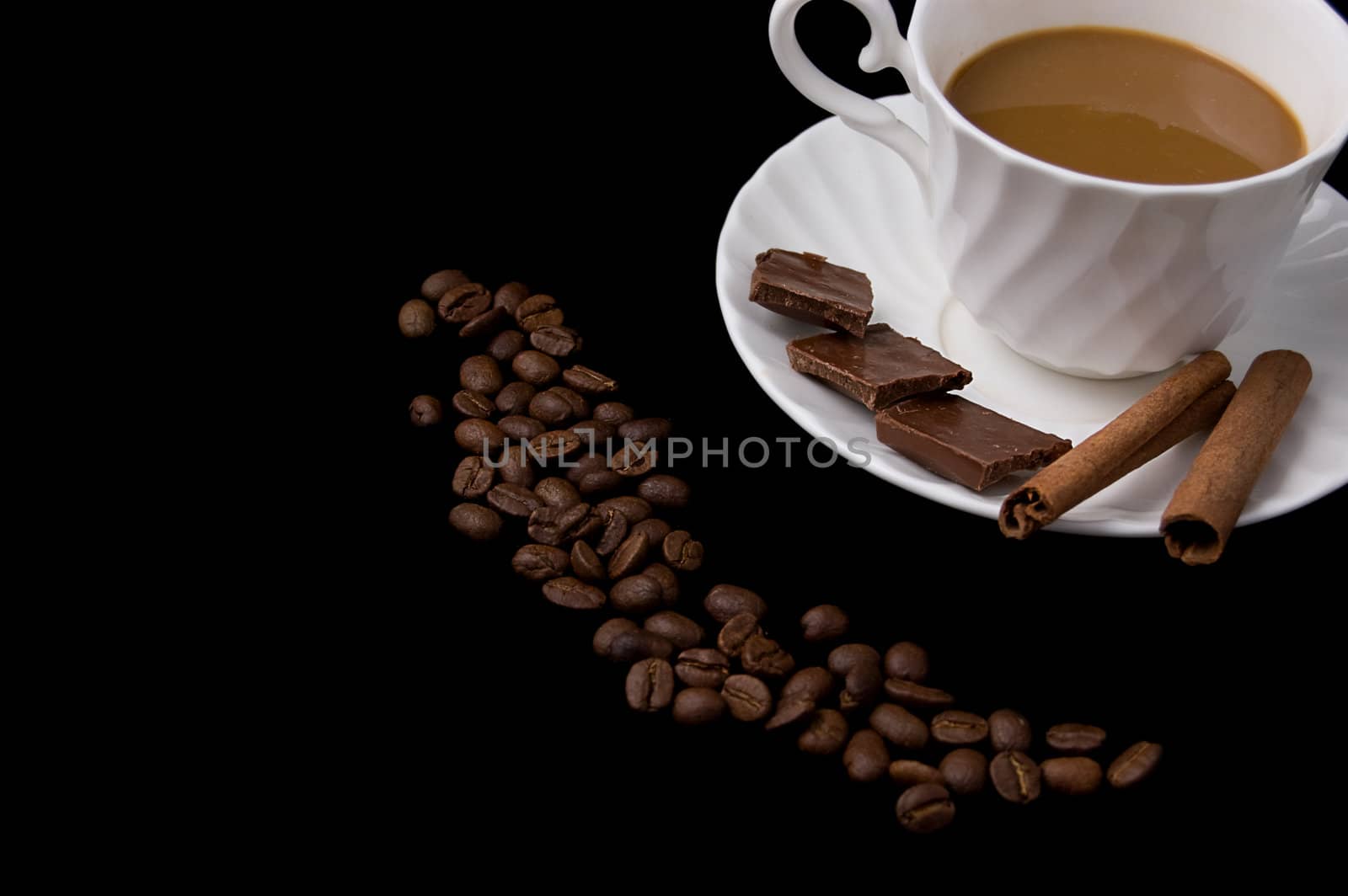 Cappuccino, coffee beans, cinnamon and chocolate by Angel_a