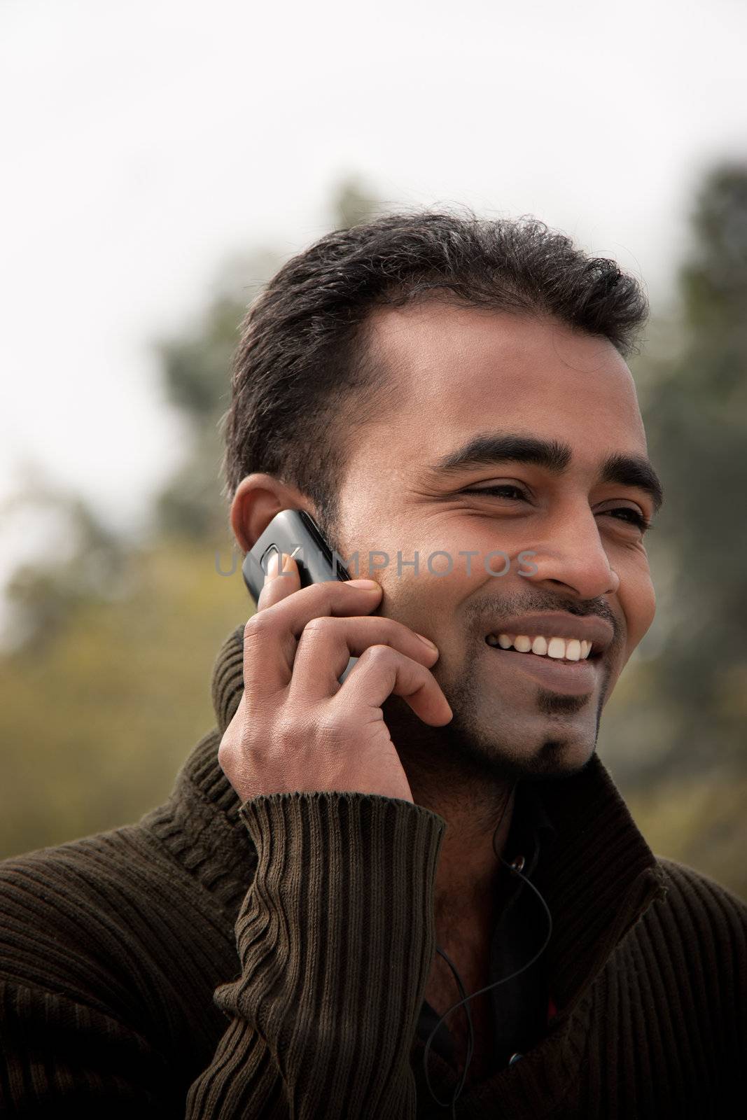 Indian man Busy on cell phone by ziprashantzi