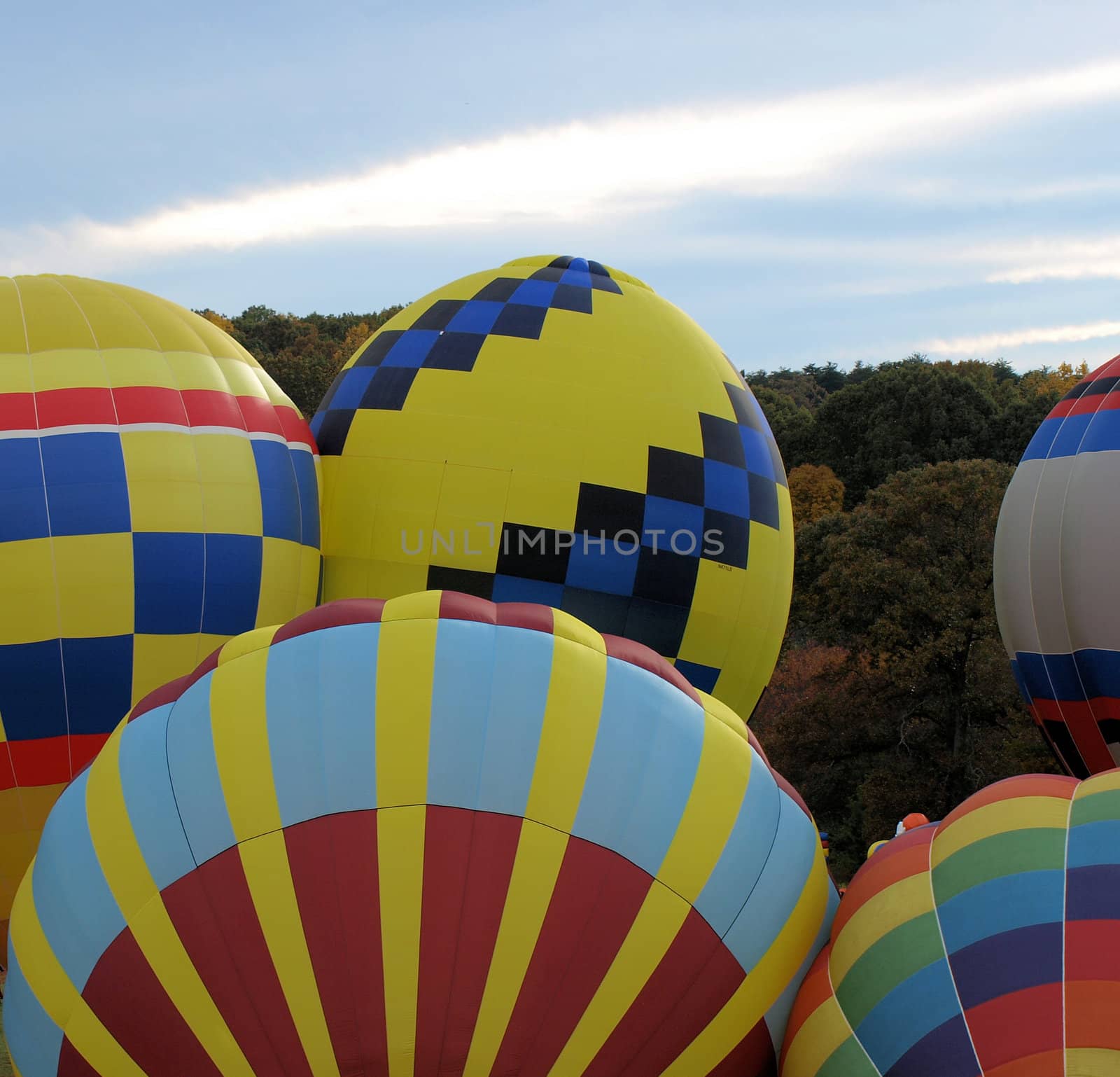 Hot air balloons filling up before their take-off flight