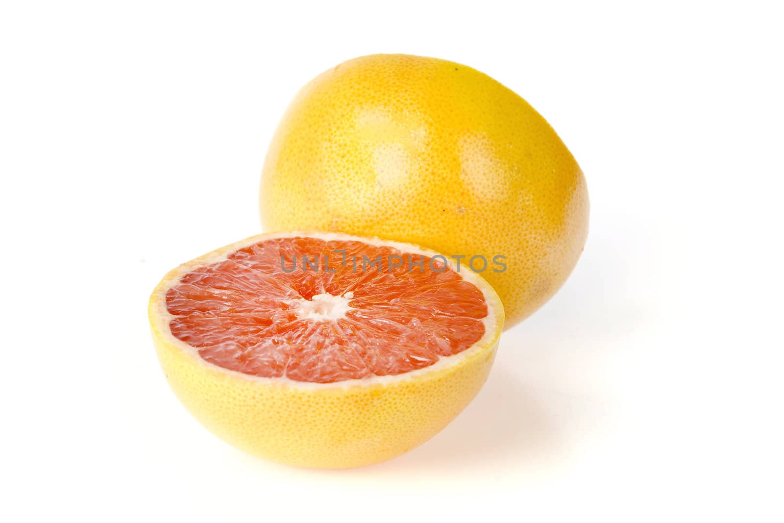 a grapefruit on a white background