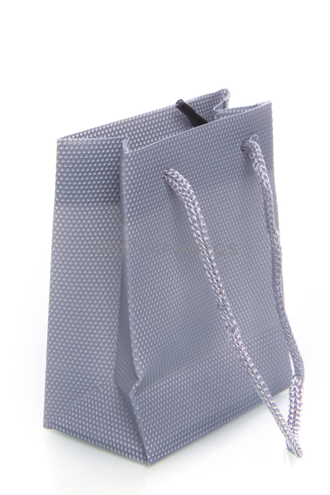 a gray bag on a white background