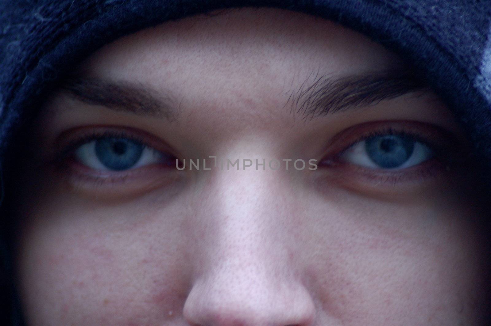 Stunning eyes and nose of a beautiful young man.