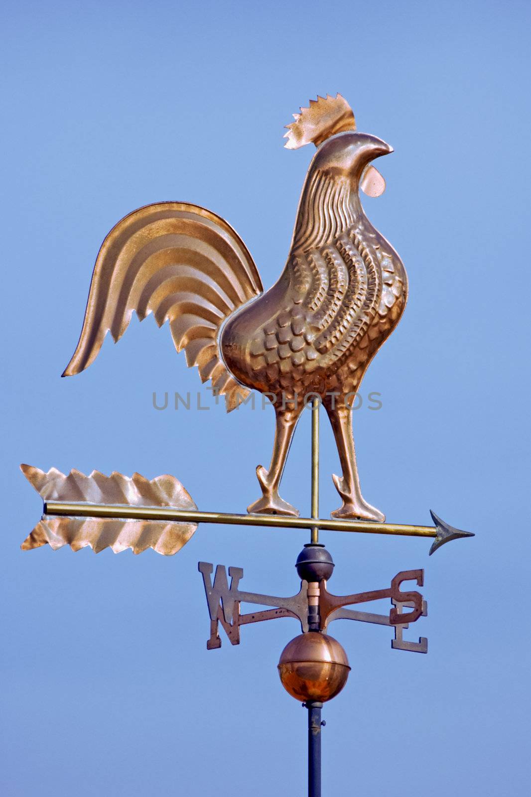 A weathercock indicates wind direction