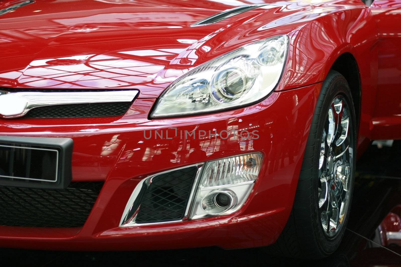 Half close up of a red sports car