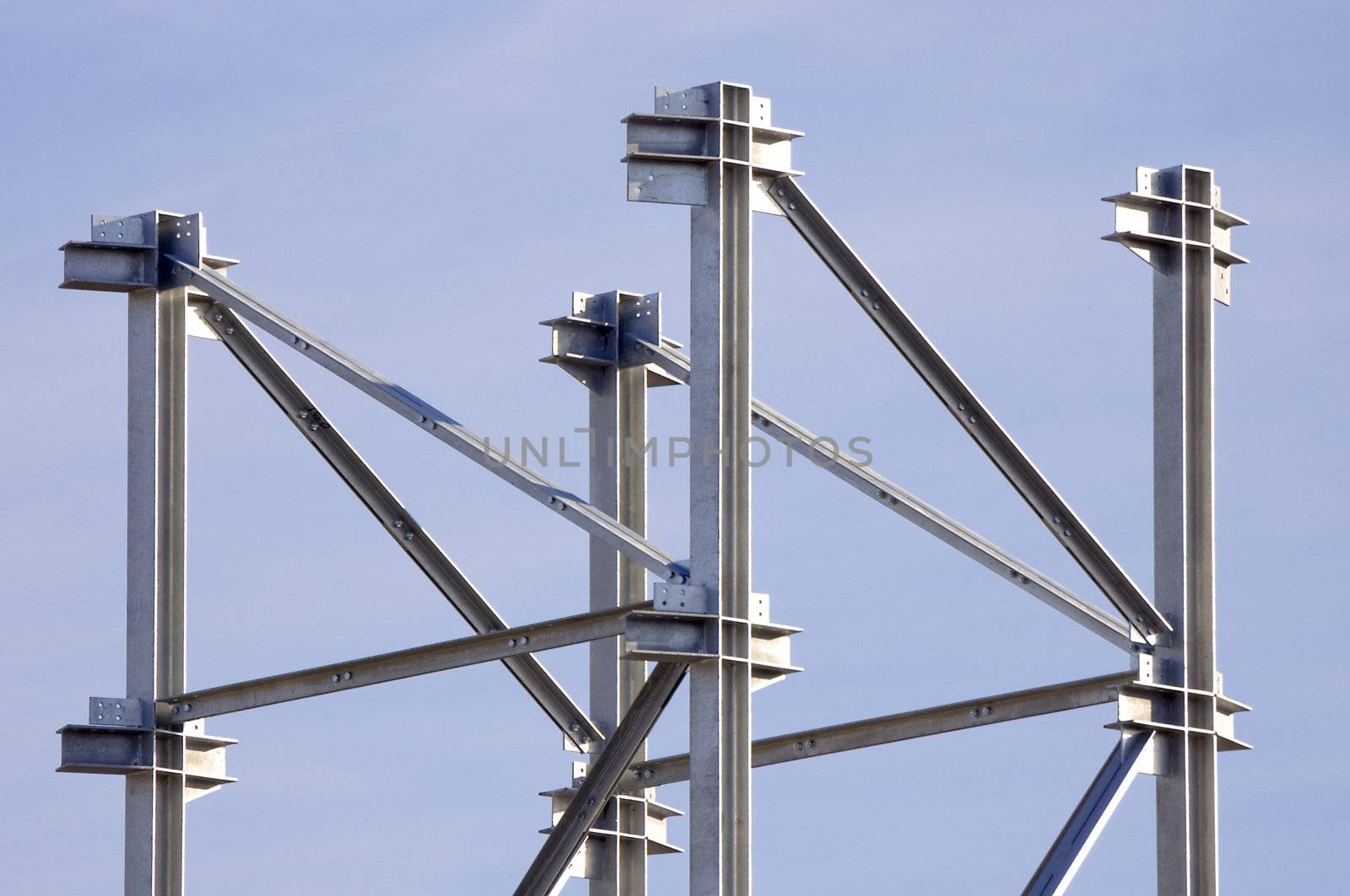 Steel framework against a blue sky