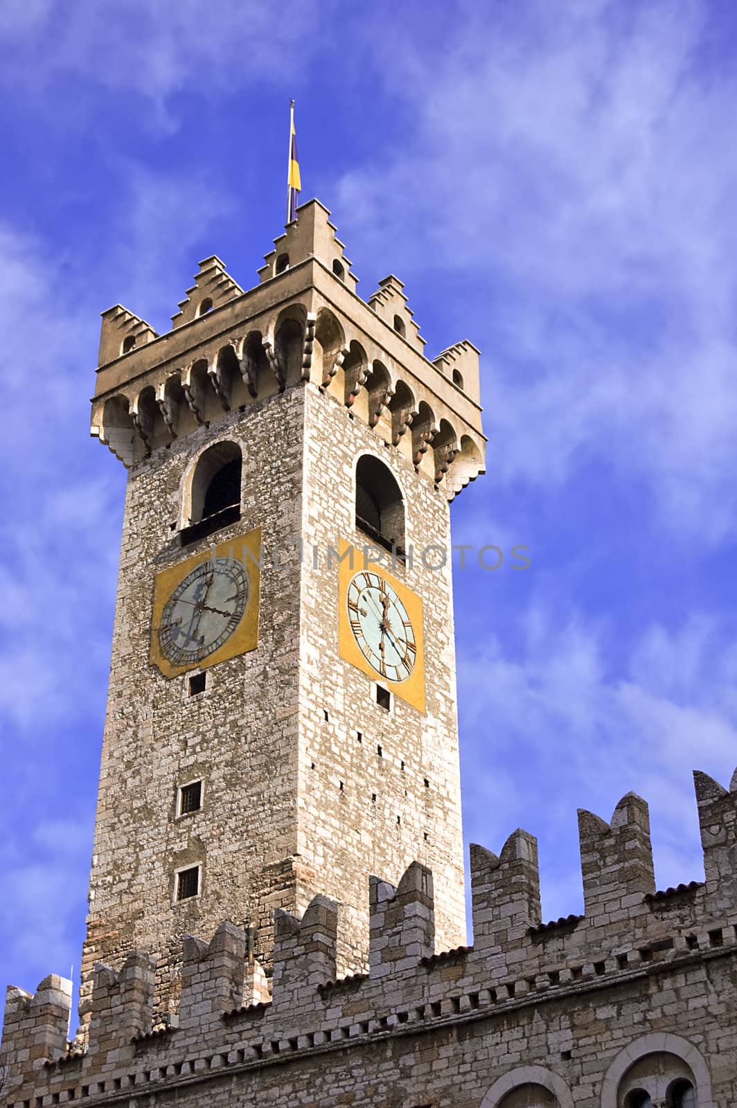Medieval tower with clock of a caste in Trento (Italy)