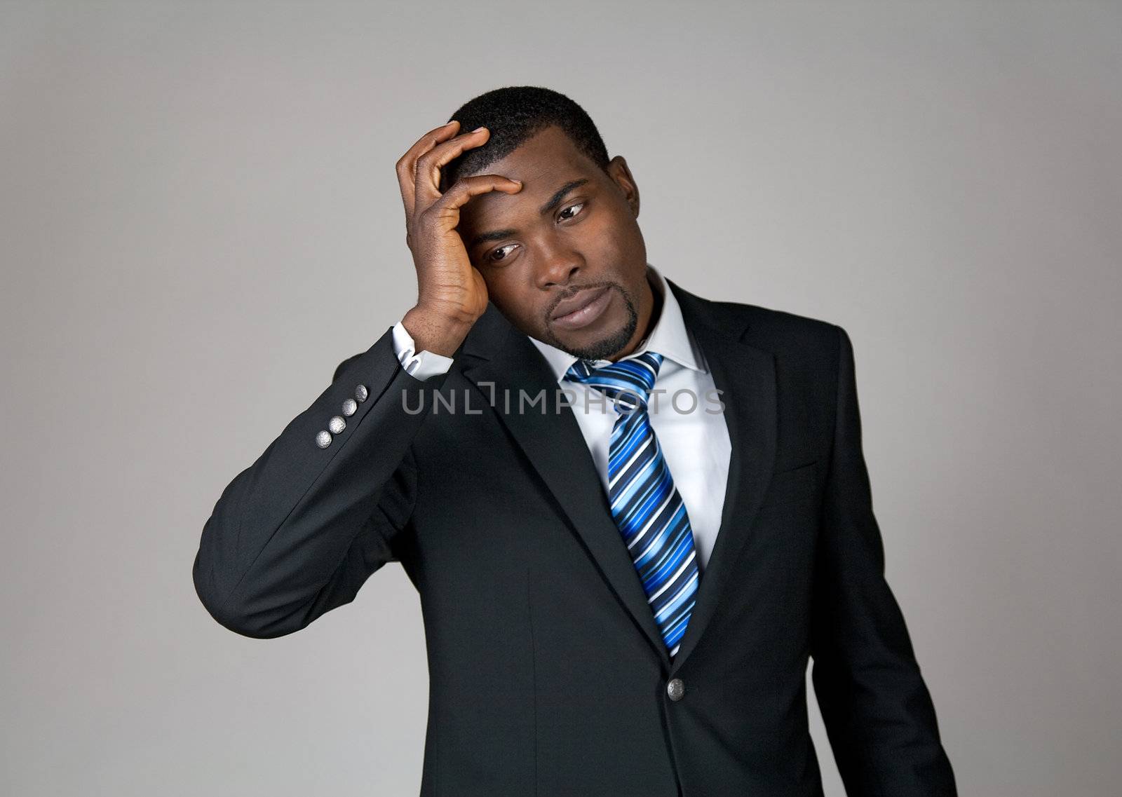 Business going wrong. African American businessman looking frustrated.