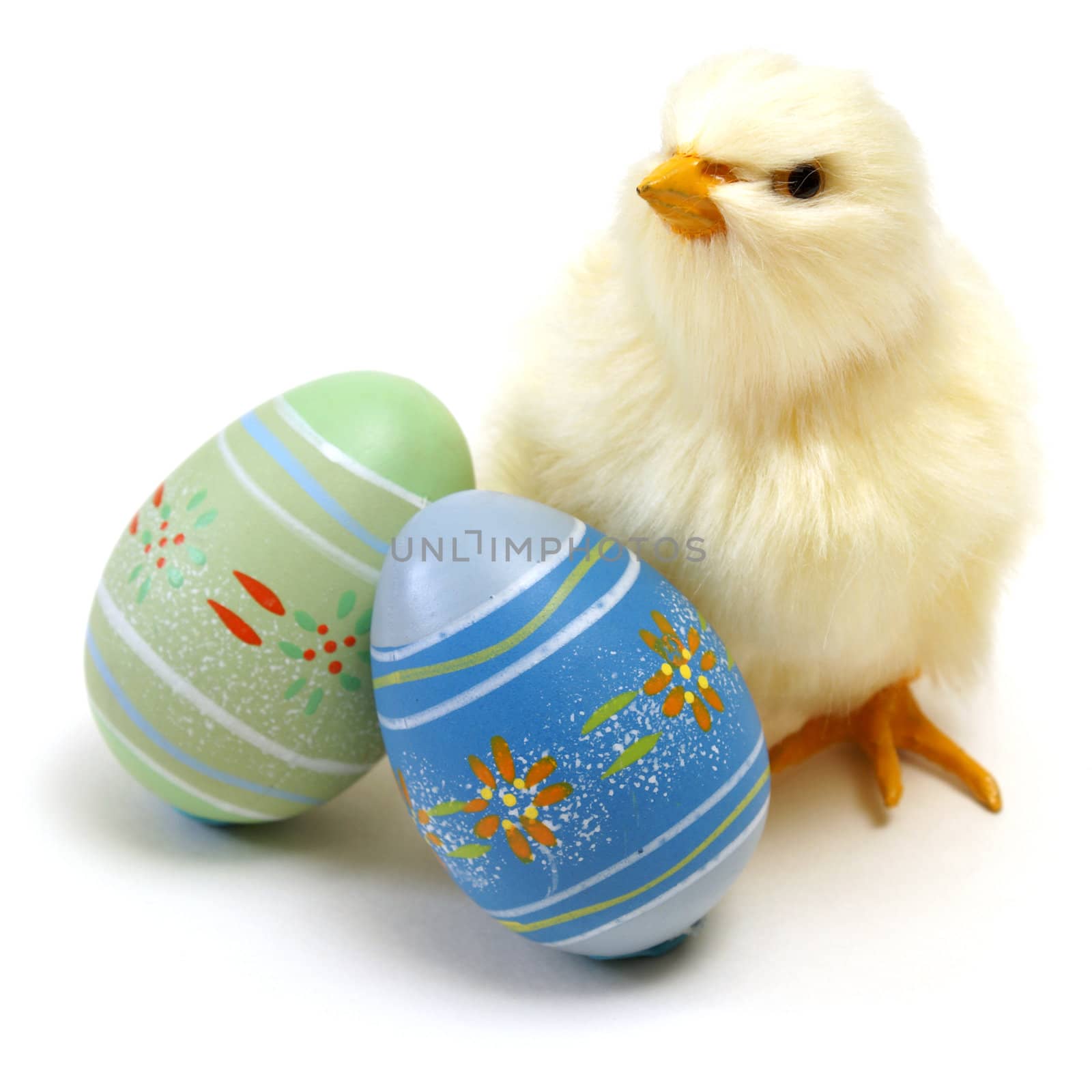 An isolated shot of an Easter chick and some eggs for the seasonal holiday.