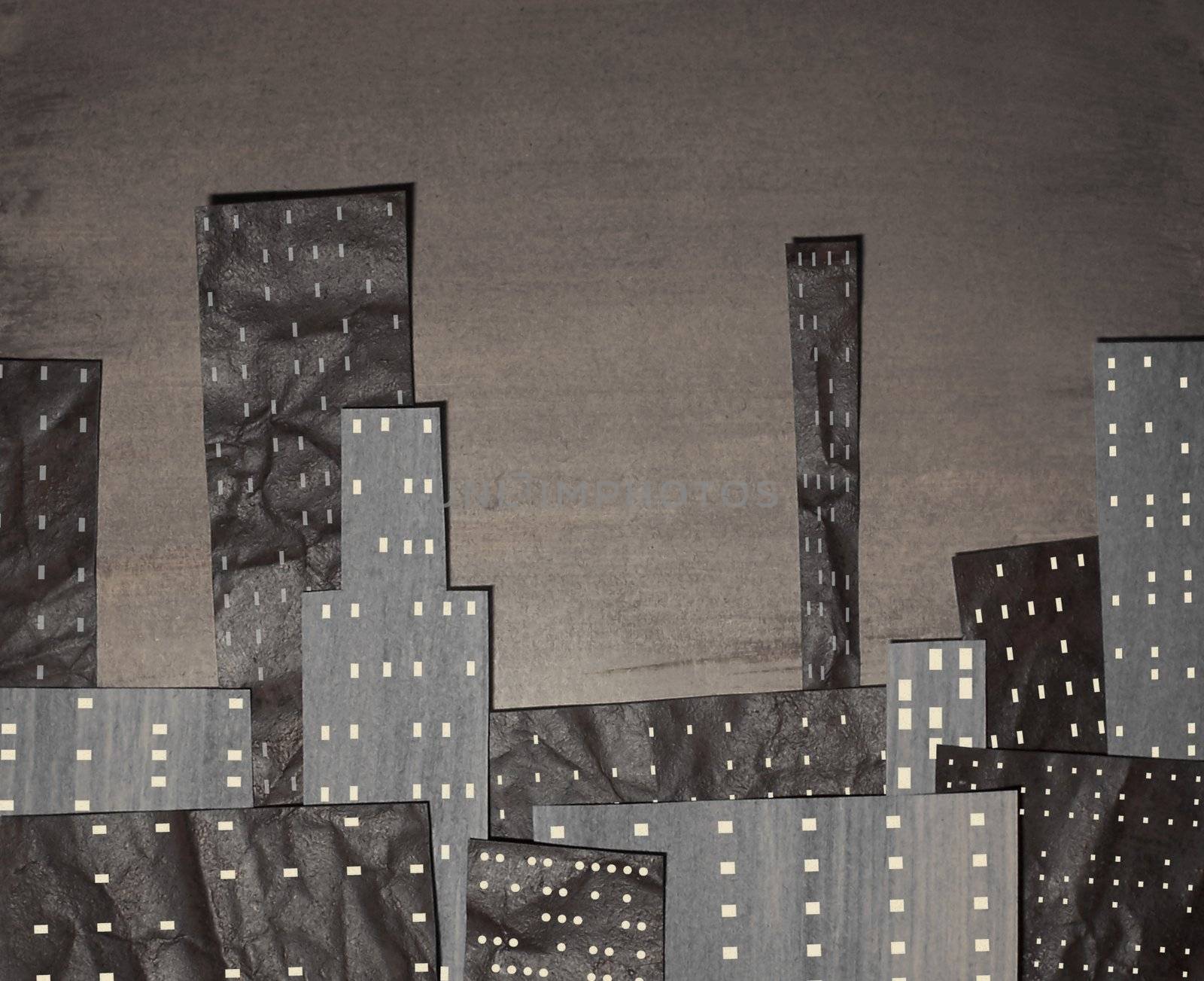 Sepia coloured city made from cut out painted card