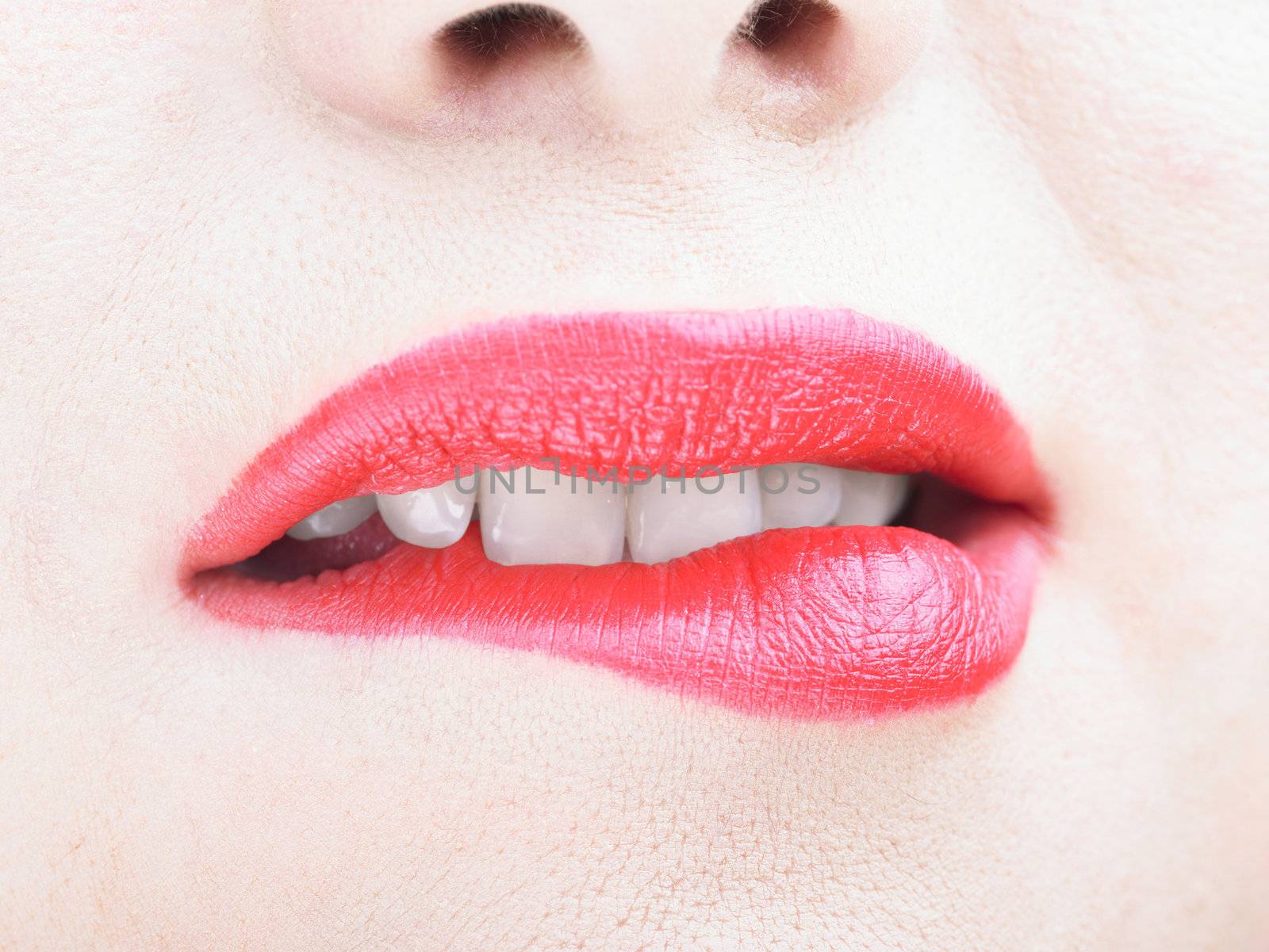 Teeth Biting Sensual Red Lips with great makeup, bit lip