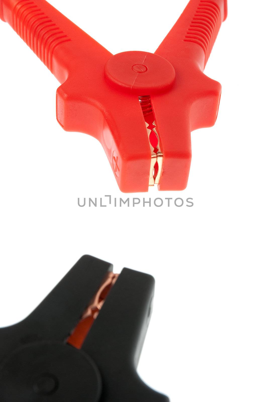 Red and black battery cables isolated on white background.