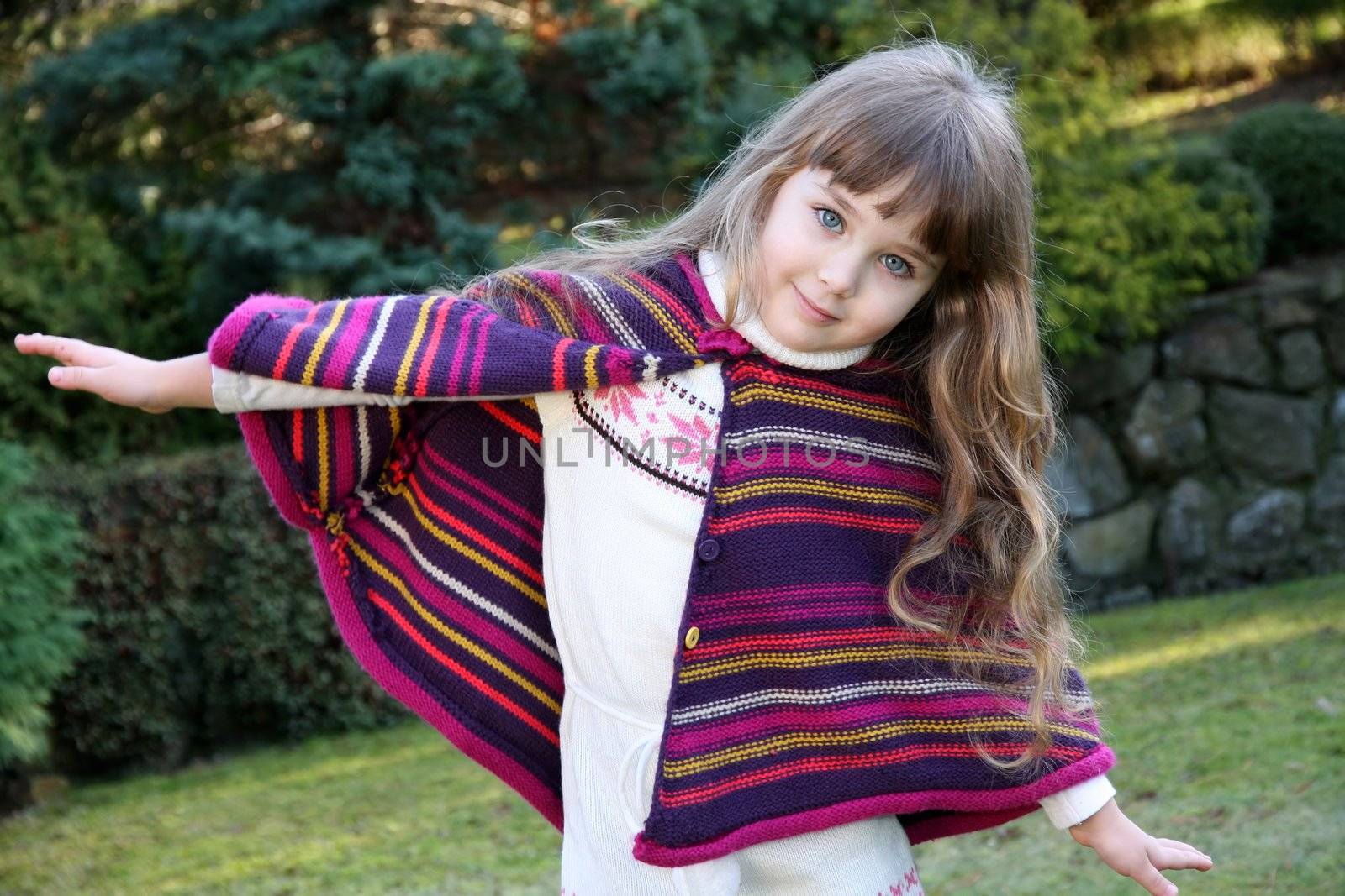 Beautiful little portrait of girl in park