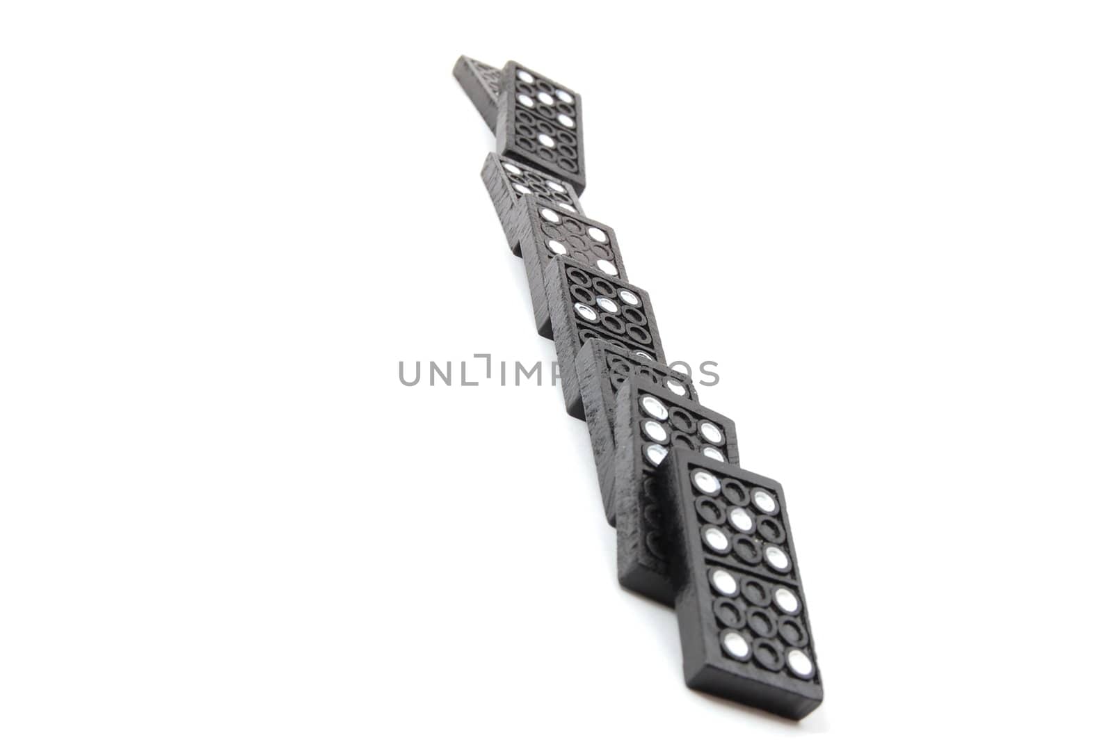chain of dominoes isolated on a white background