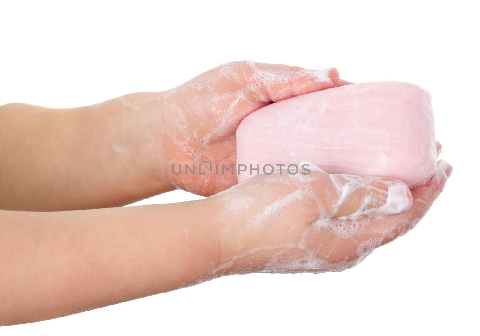 toilet soap in child's hands, isolated on white