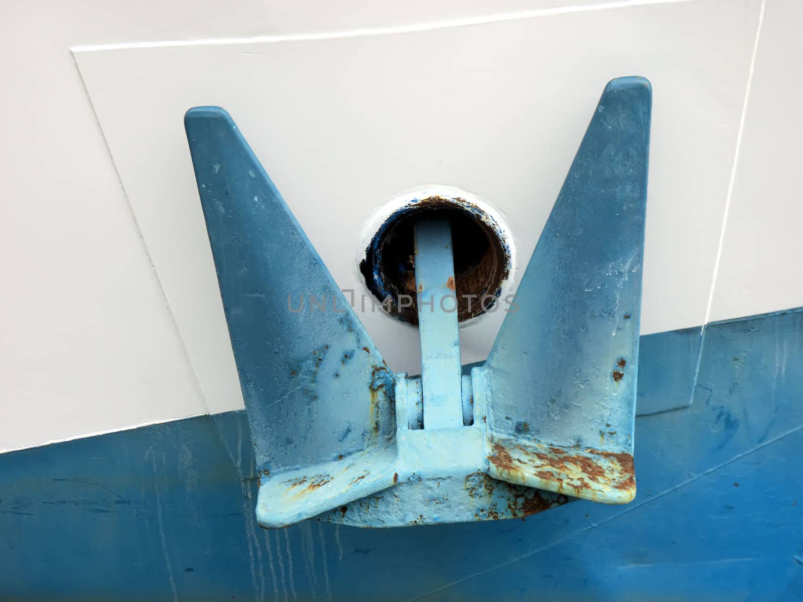 a  blue anchor on a boat