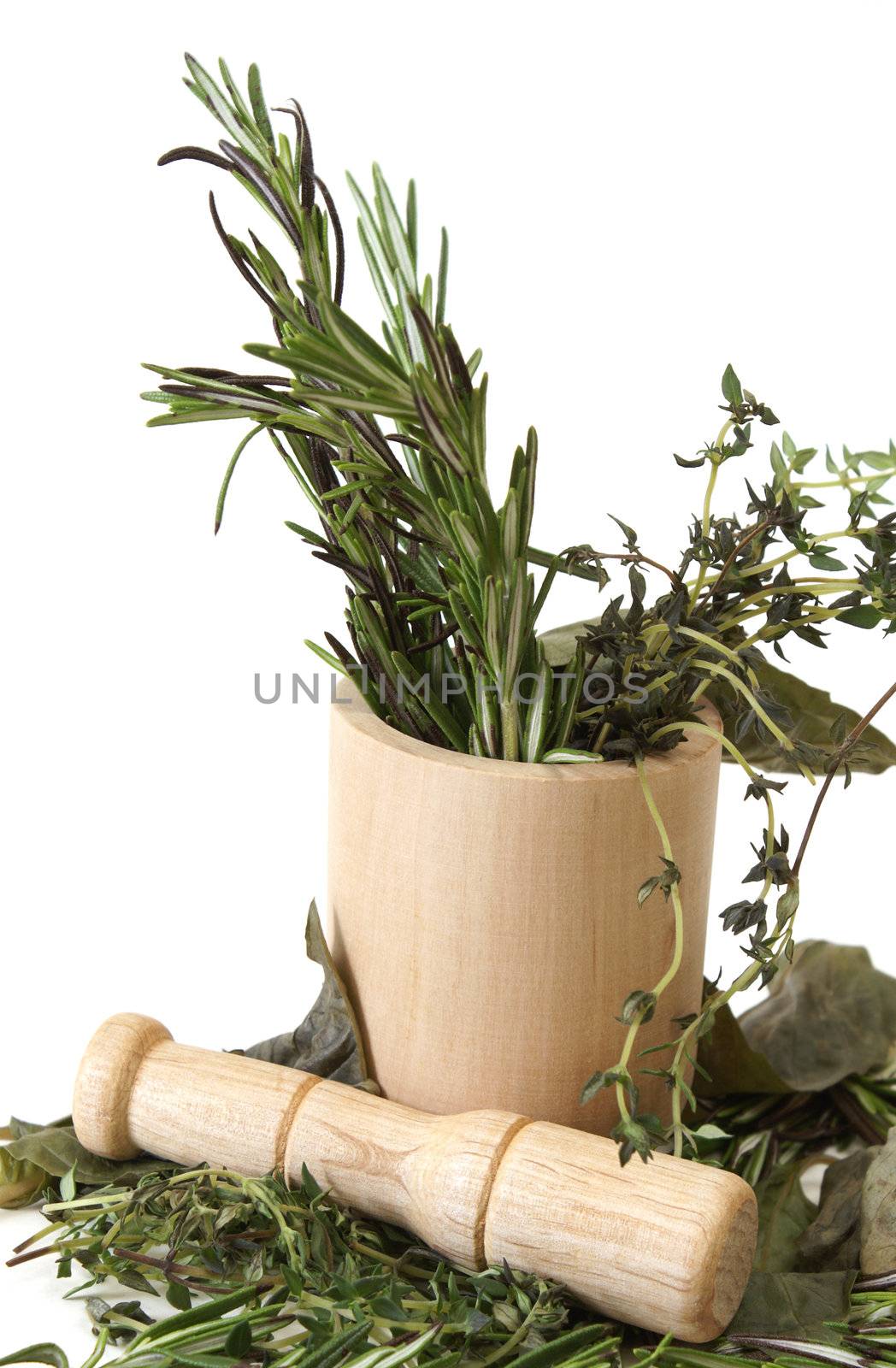 Preparing herbs in a mortar and pestle.