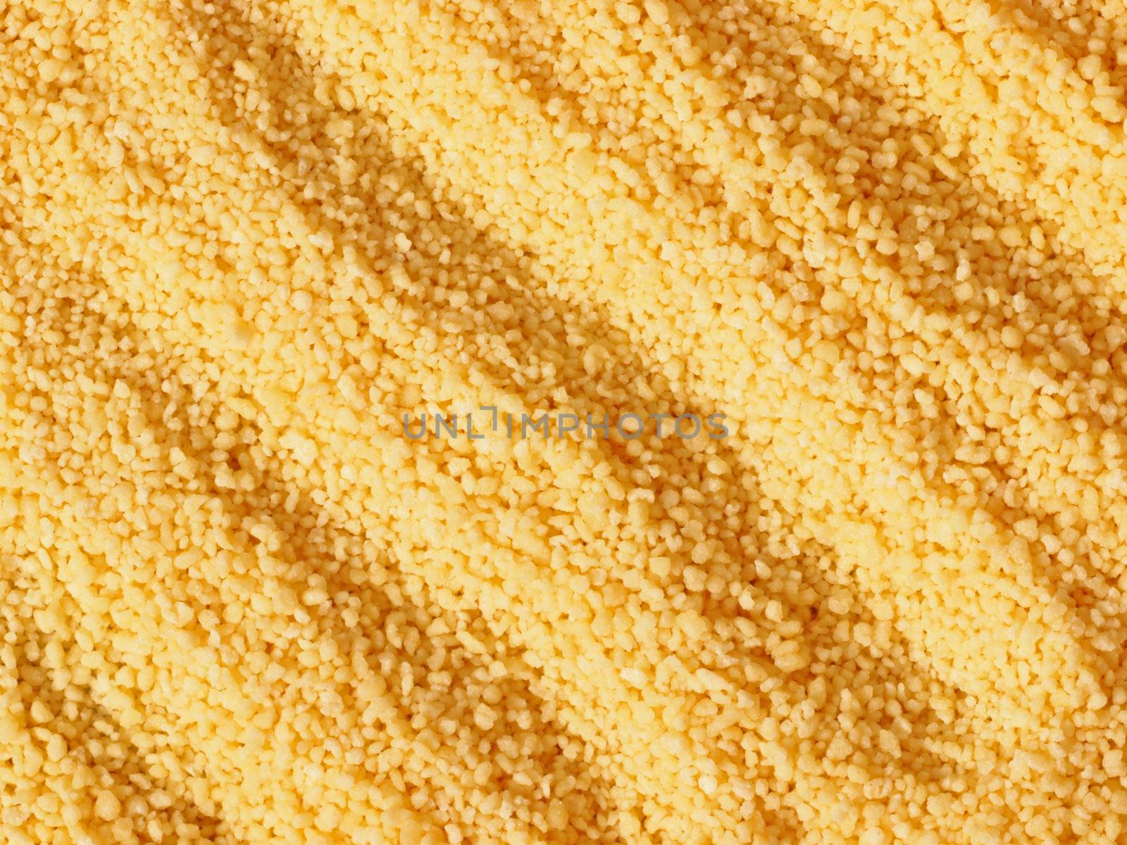 close up of a heap of raw couscous