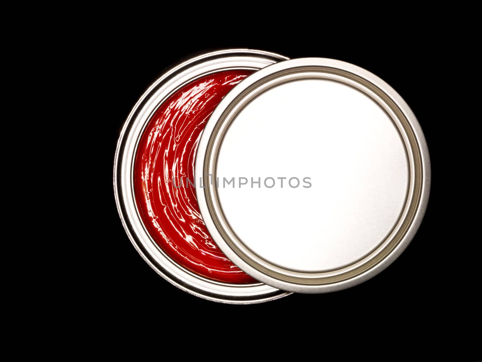 Red Paint can from above on black background