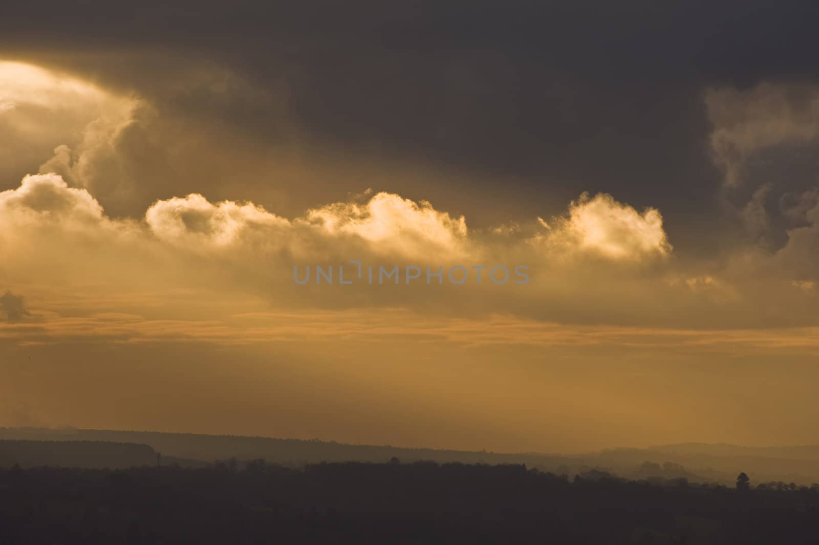 Beautiful colorful sunset over countryside landscape