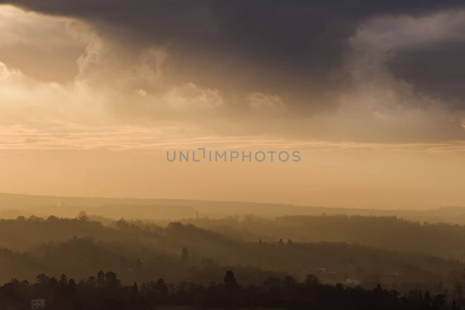 Stunning colorful sunset over countryside landscape by Veneratio